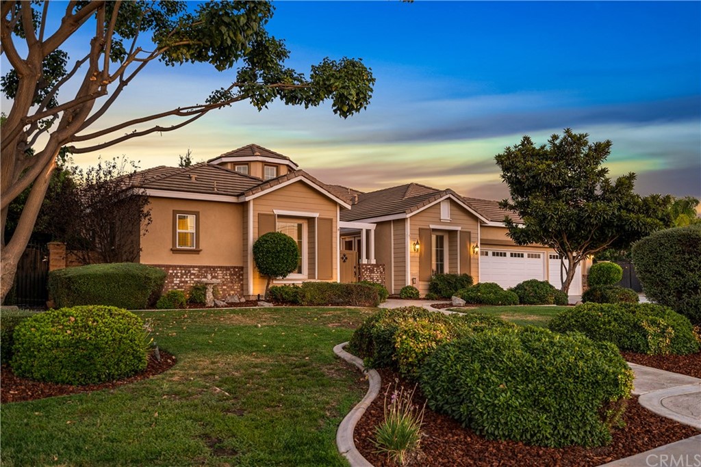 8148 Wood Road Riverside, CA 92508 - Photo 1 of 1 a front view of a house with garden
