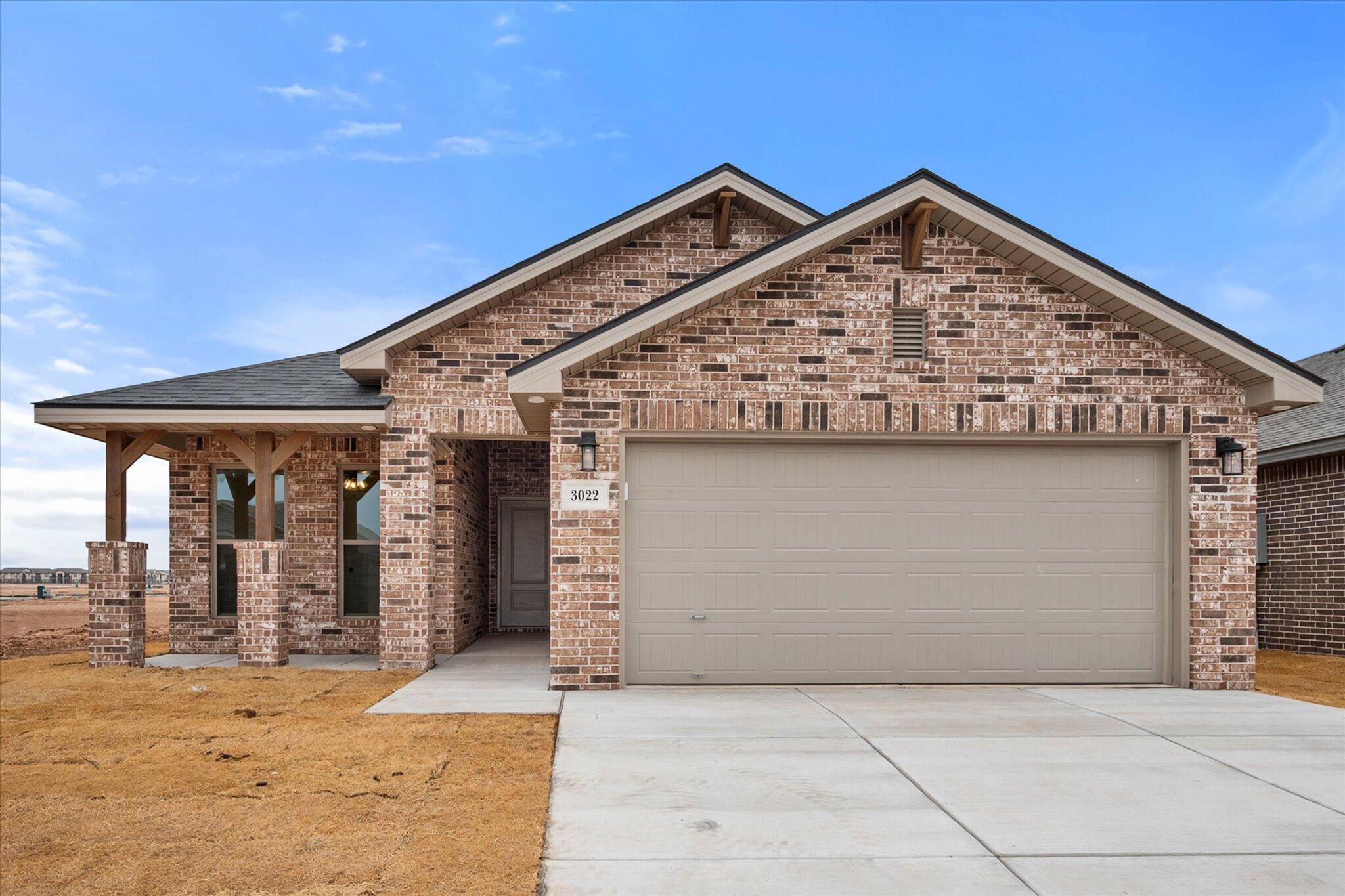 3022 140th Street Lubbock, TX 79423 - Photo 1 of 20 a view of a house with a garage