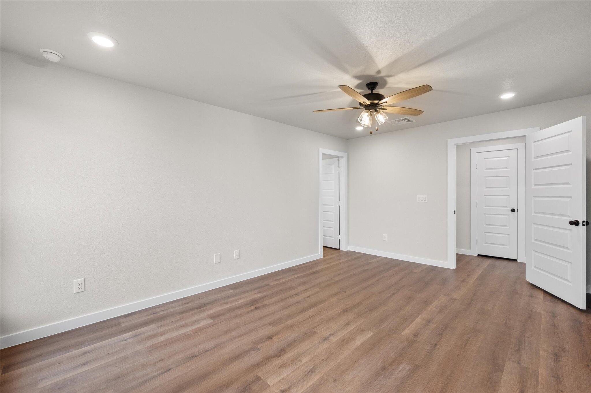 3022 140th Street Lubbock, TX 79423 - Photo 18 of 20 wooden floor in an empty room