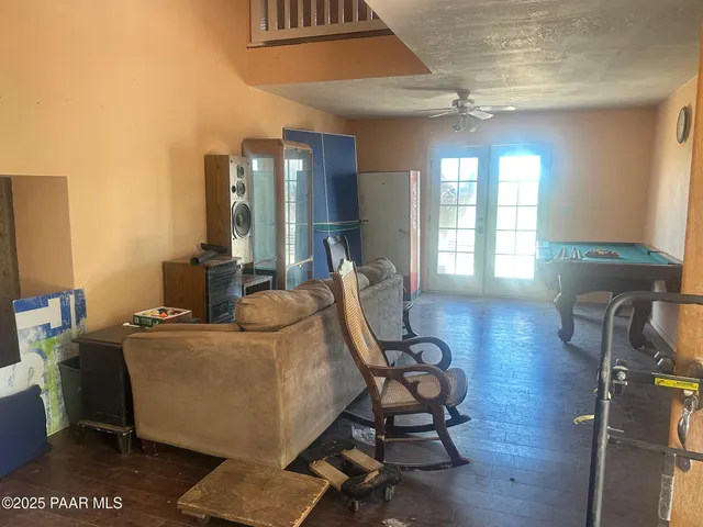 a bathroom with a sink a toilet and a window
