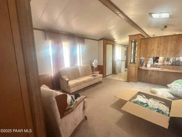 a living room with furniture and a couch