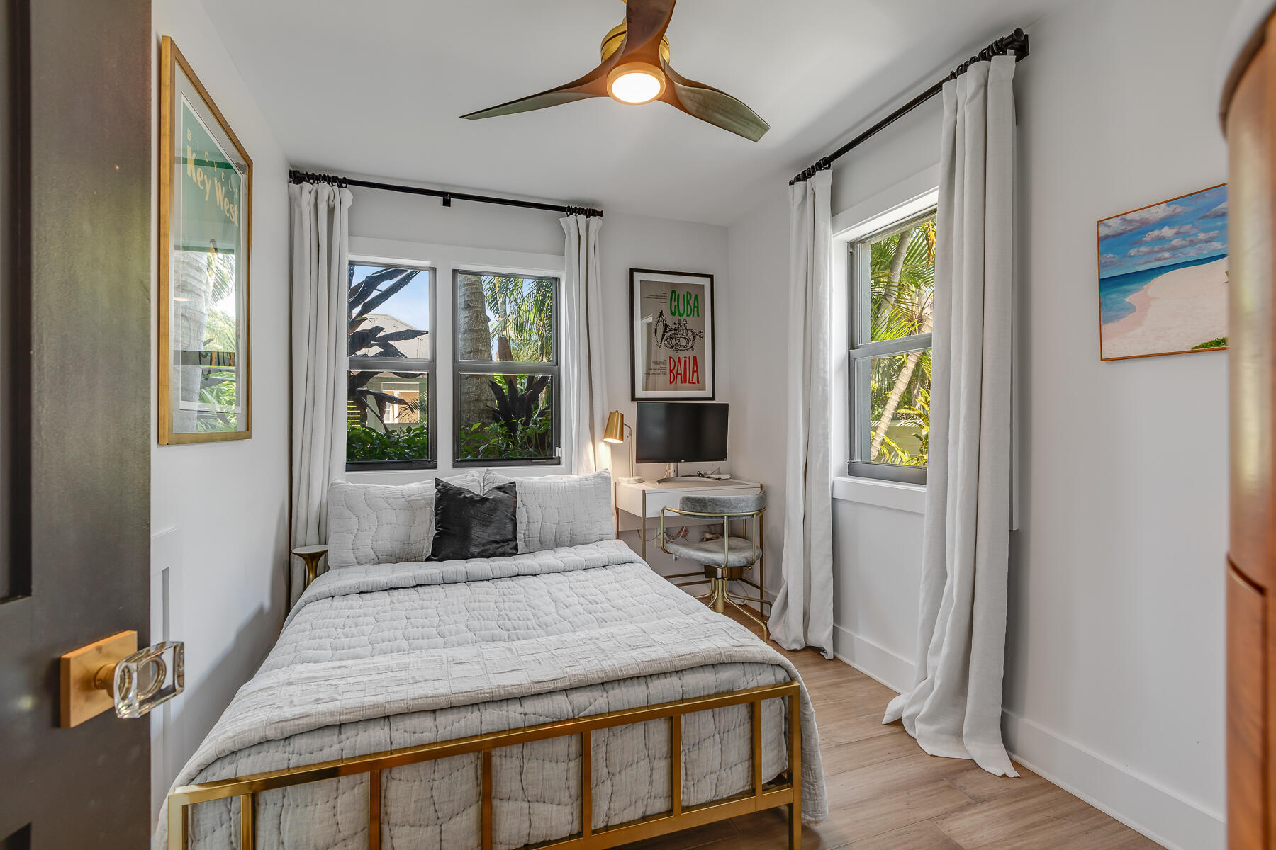 1708 Laird Street Key West, FL 33040 - Photo 16 of 43 a bedroom with a large bed and a large window