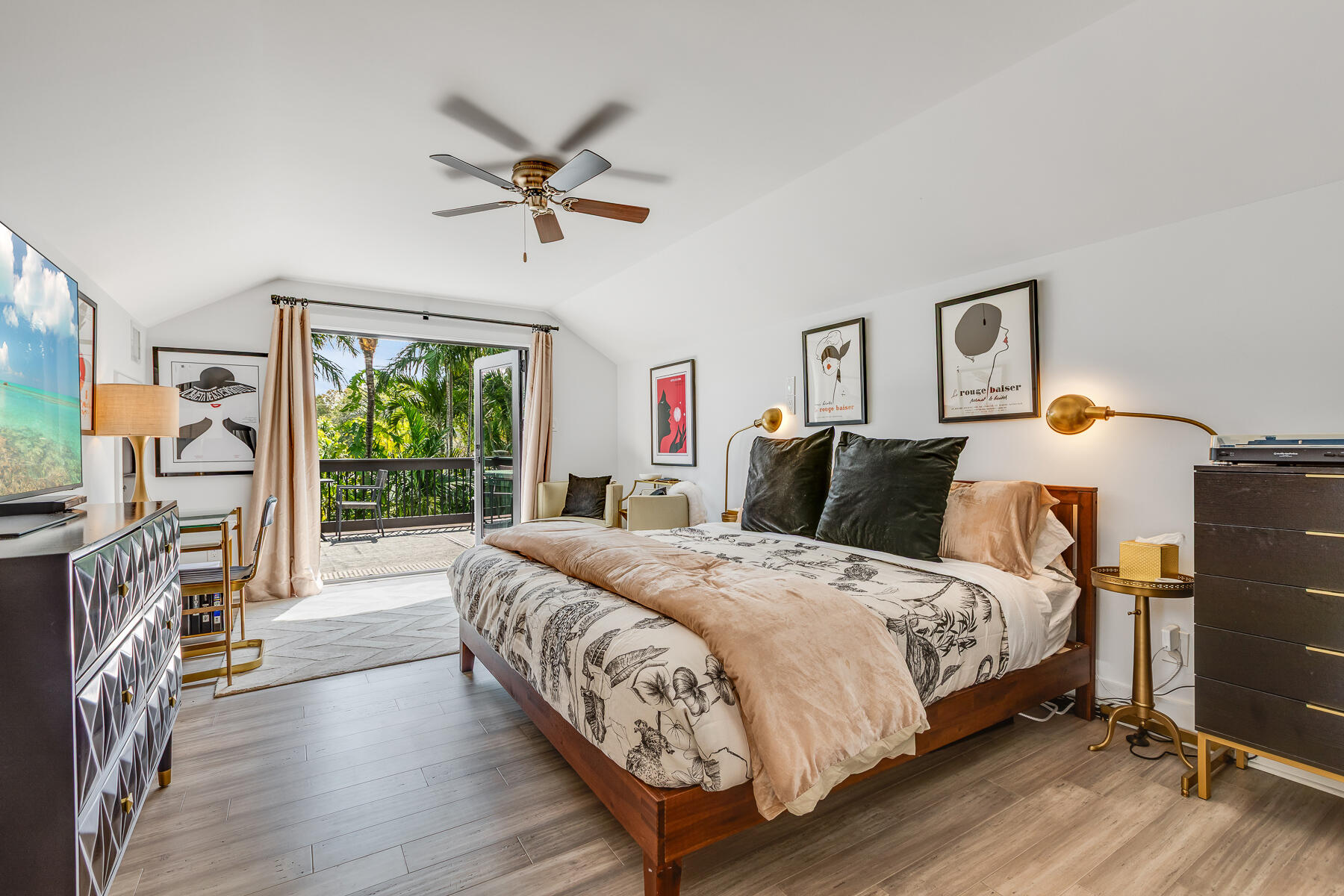 1708 Laird Street Key West, FL 33040 - Photo 30 of 43 a bed room with a bed and a flat tv screen