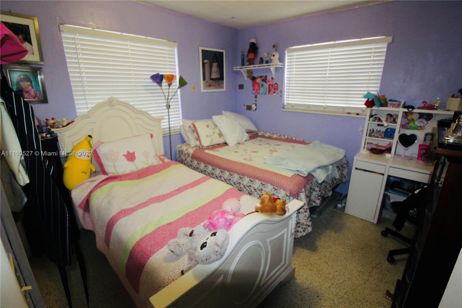 46 Northwest 35th Street Miami, FL 33127 - Photo 15 of 21 a bedroom with bed and a window