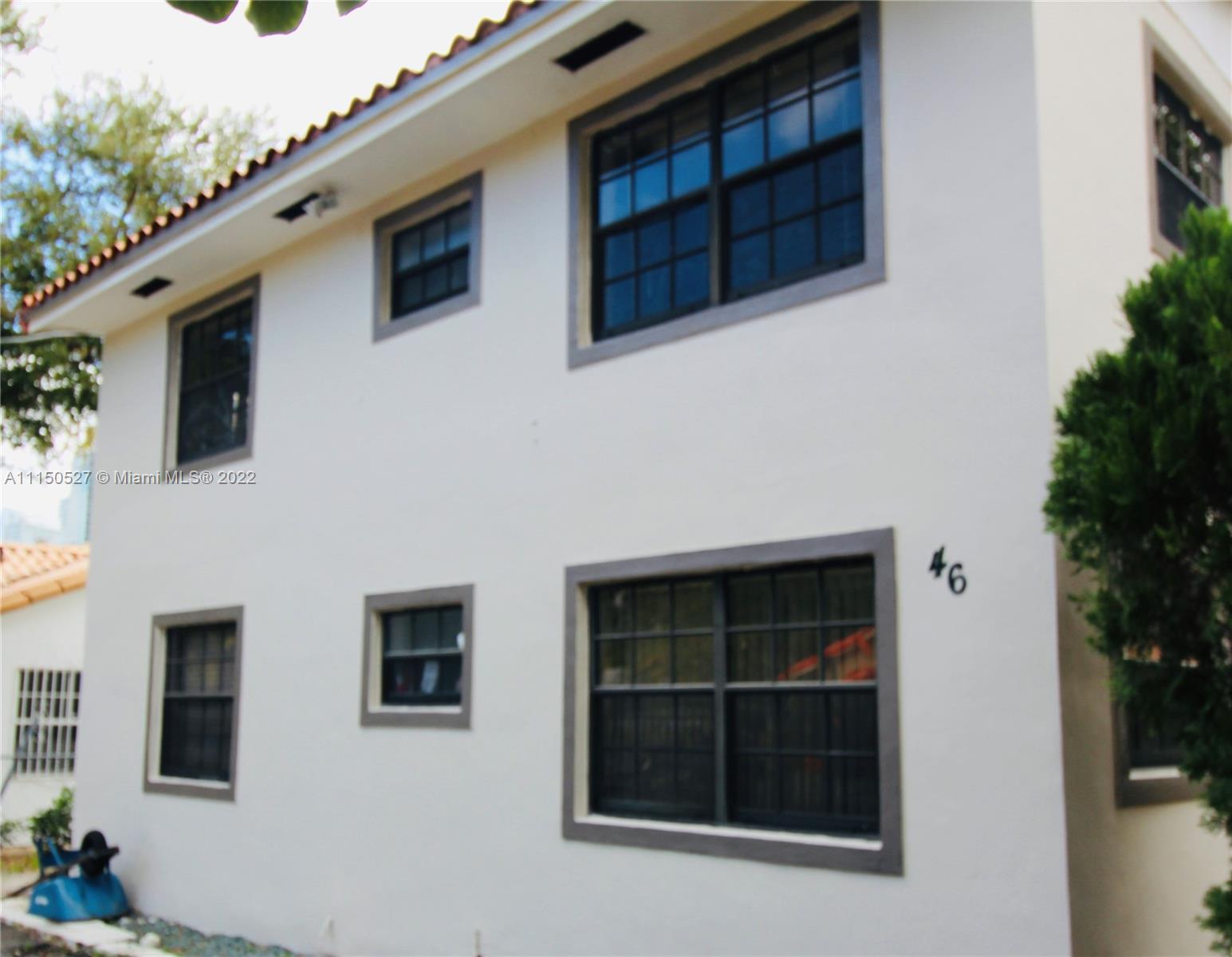 46 Northwest 35th Street Miami, FL 33127 - Photo 3 of 21 a view of a house with a large window