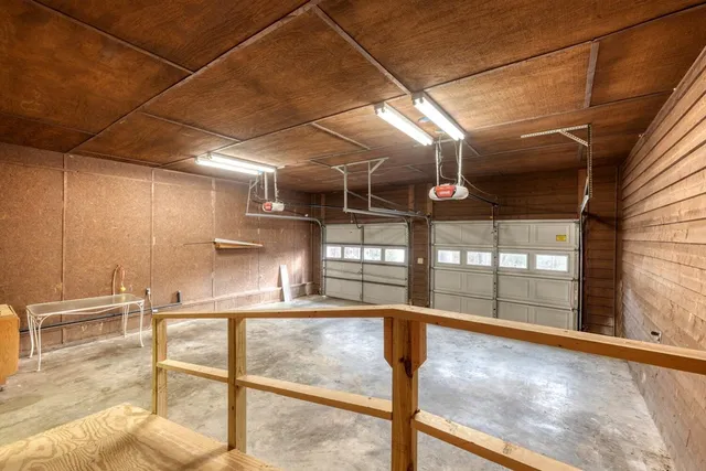 a view of an empty room with windows