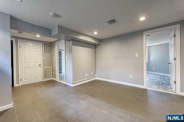 407 Hudson Street, Unit 1 Hackensack, NJ 07601 - Photo 6 of 8 an empty room with closet area