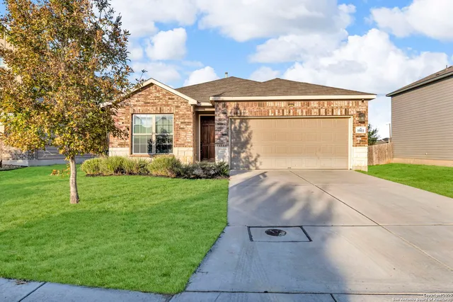 a front view of house with yard