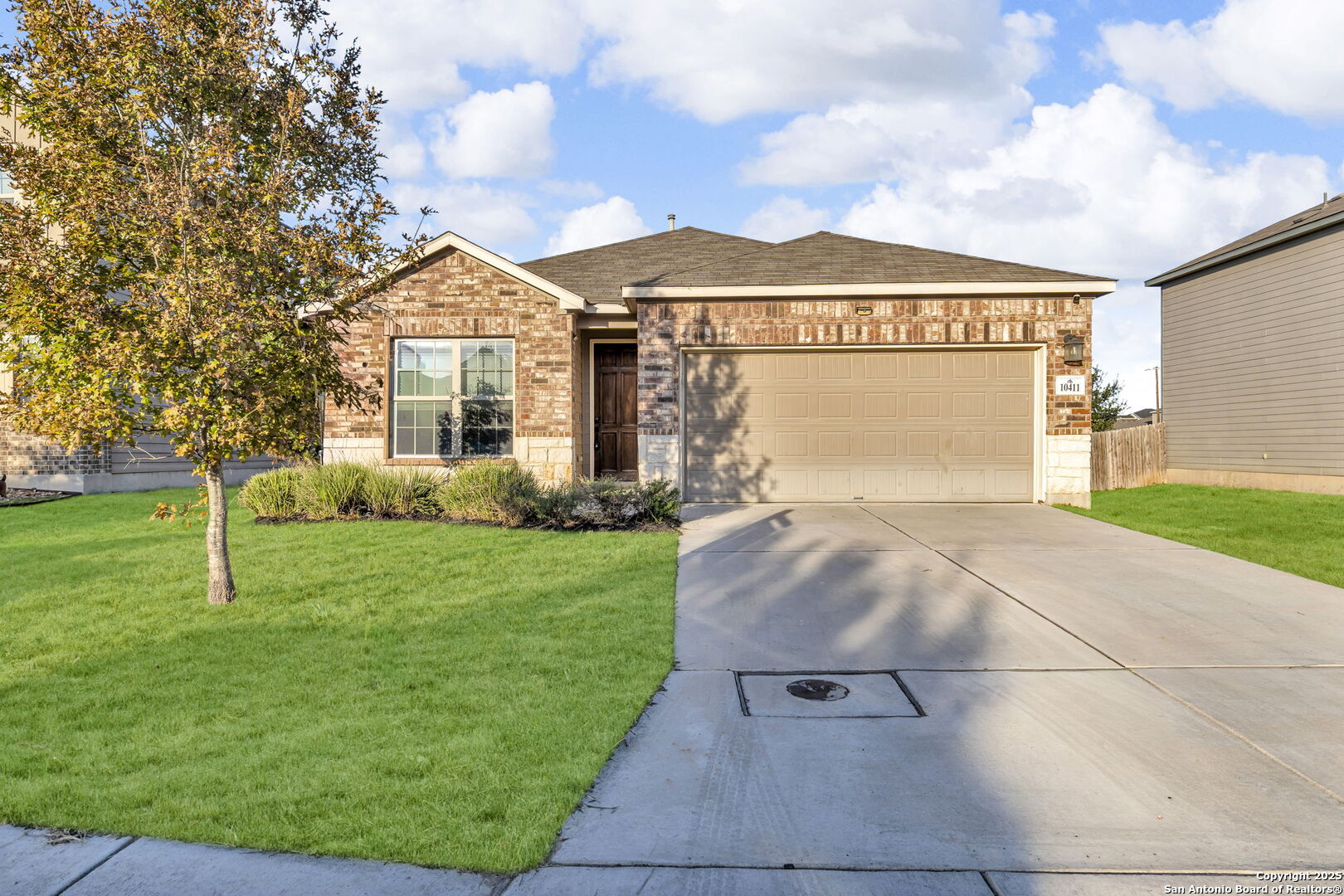 a front view of house with yard
