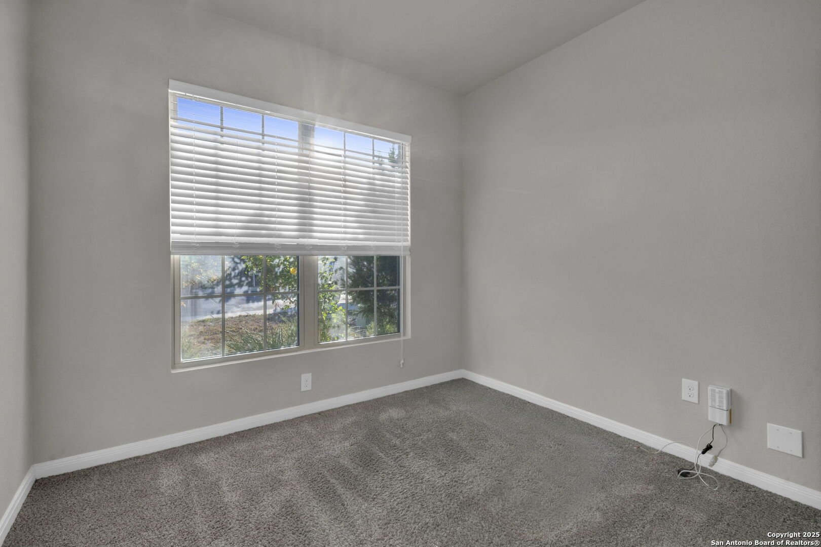 10411 Francisco Way Converse, TX 78109 - Photo 16 of 25 an empty room with a window