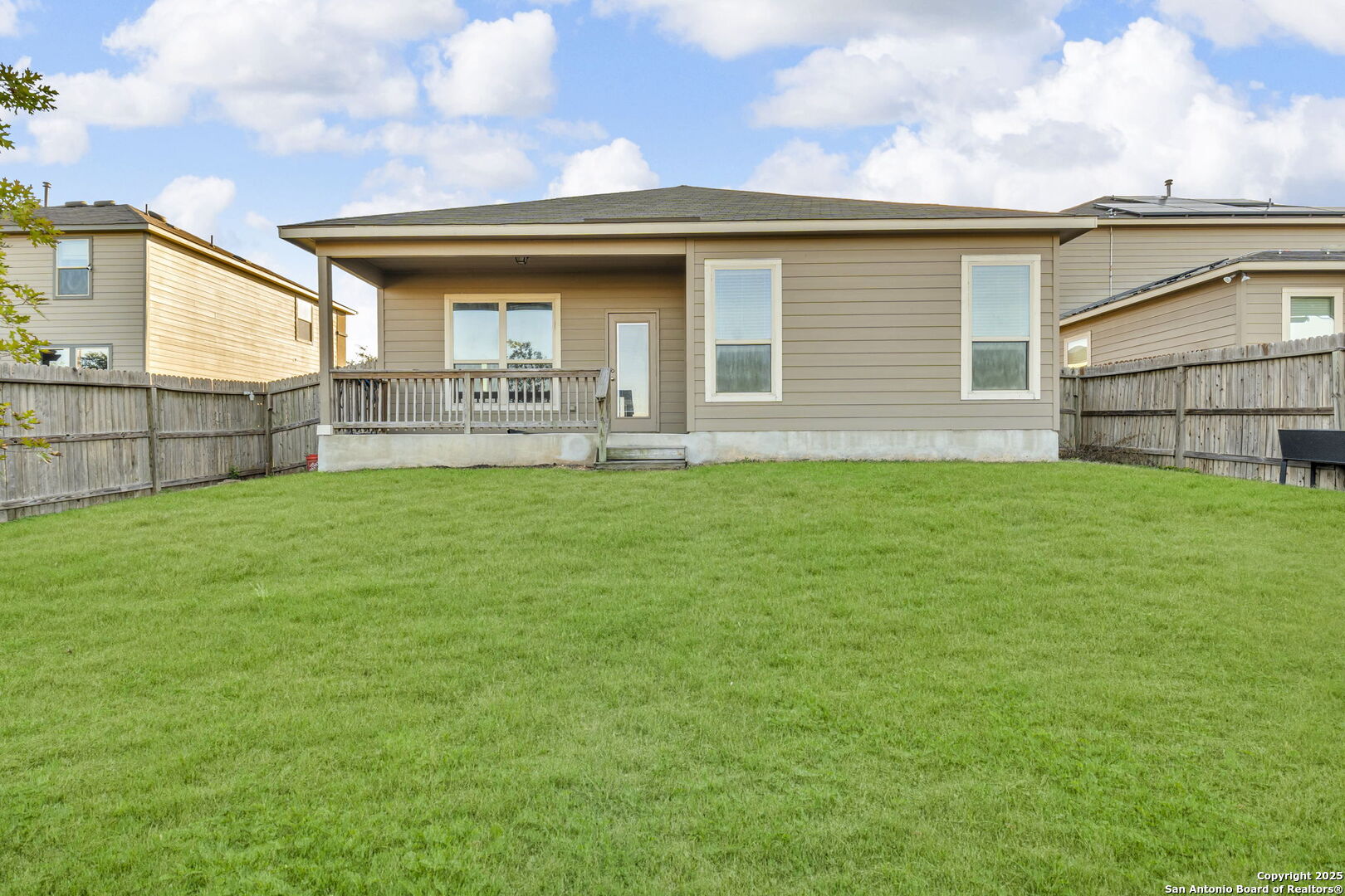 10411 Francisco Way Converse, TX 78109 - Photo 24 of 25 a view of a house with a yard and sitting area