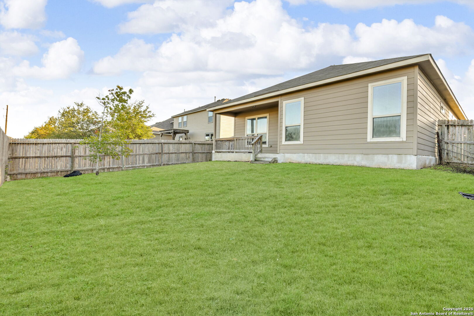 10411 Francisco Way Converse, TX 78109 - Photo 25 of 25 a view of a house with a yard and sitting area