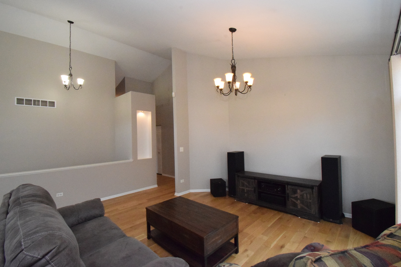 600 Countryfield Lane Elgin, IL 60120 - Photo 12 of 31 a living room with furniture and a chandelier