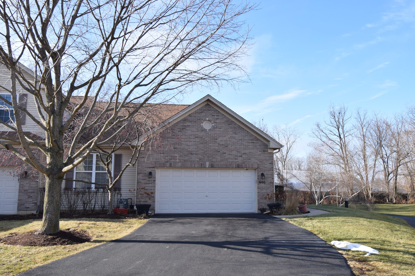 600 Countryfield Lane Elgin, IL 60120 - Photo 3 of 31 a view of a house with a yard and large tree