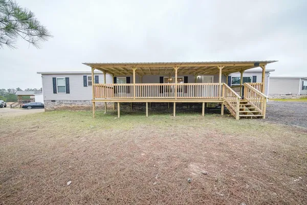 a view of house with outdoor space