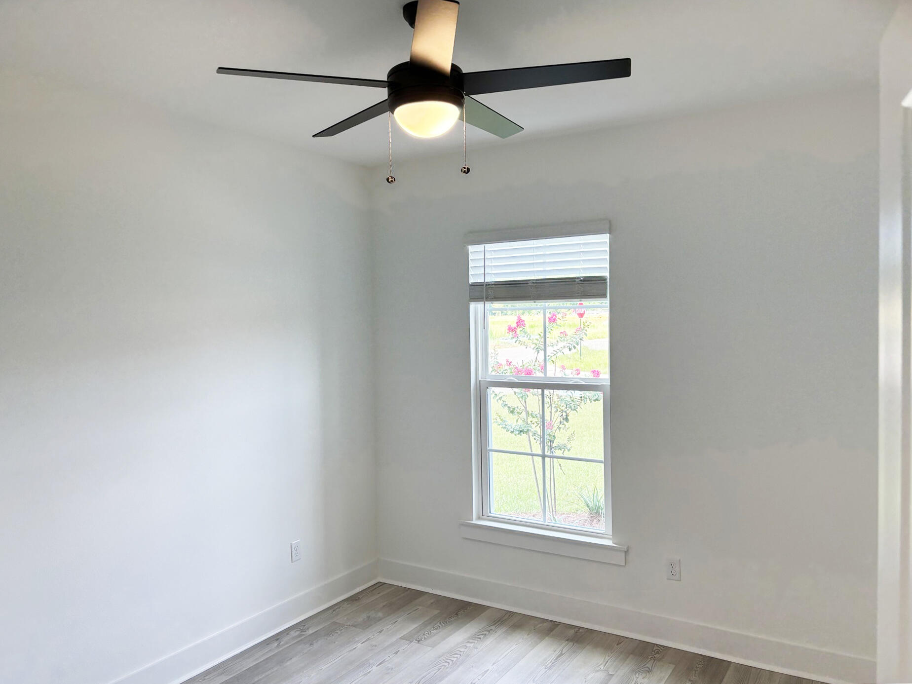 5800 Del Rio Crossing Crestview, FL 32539 - Photo 18 of 24 an empty room with a window and a fan