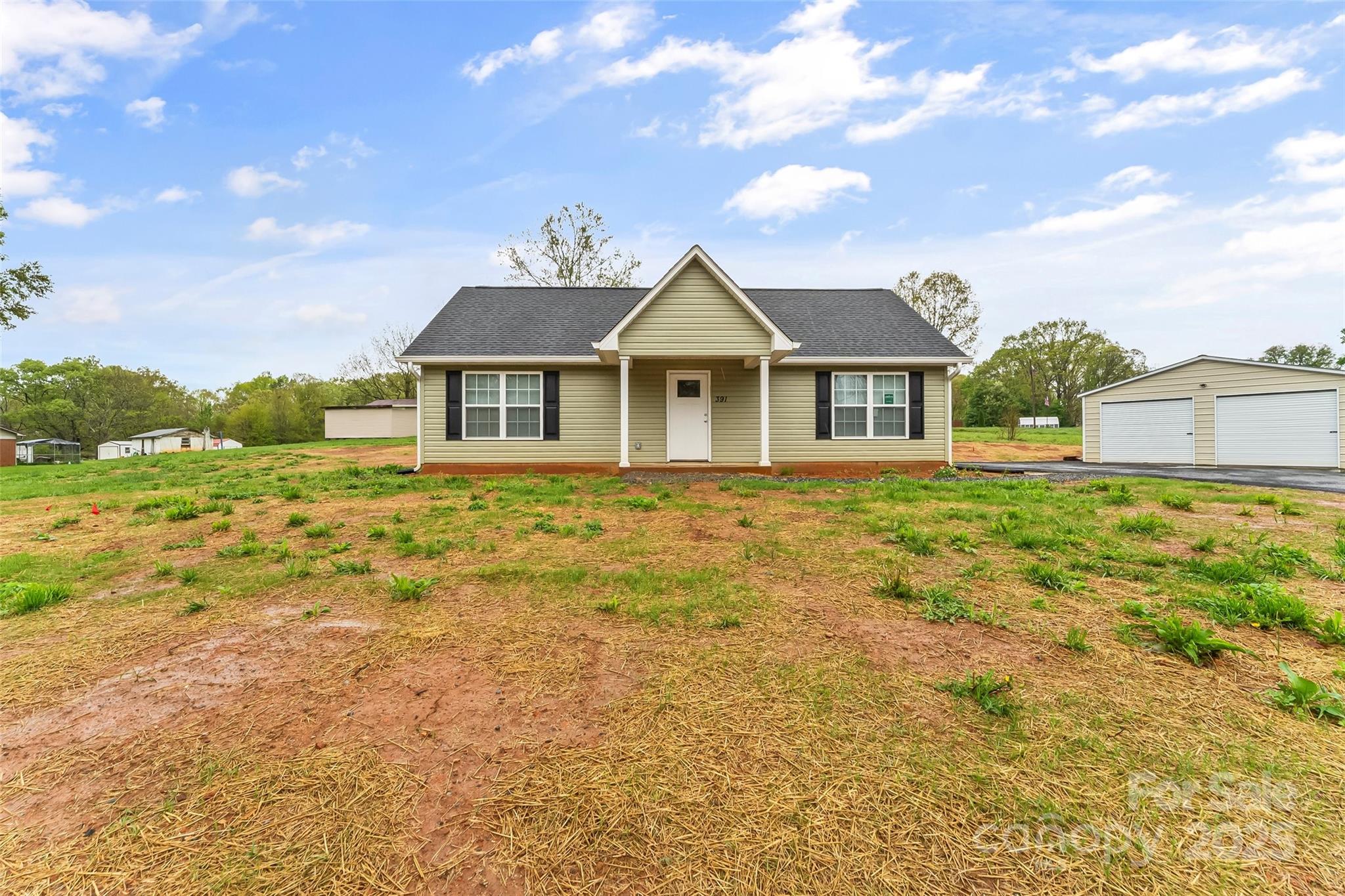 391 Springs East Road Lincolnton, NC 28092 - Photo 1 of 26 a front view of a house with a yard