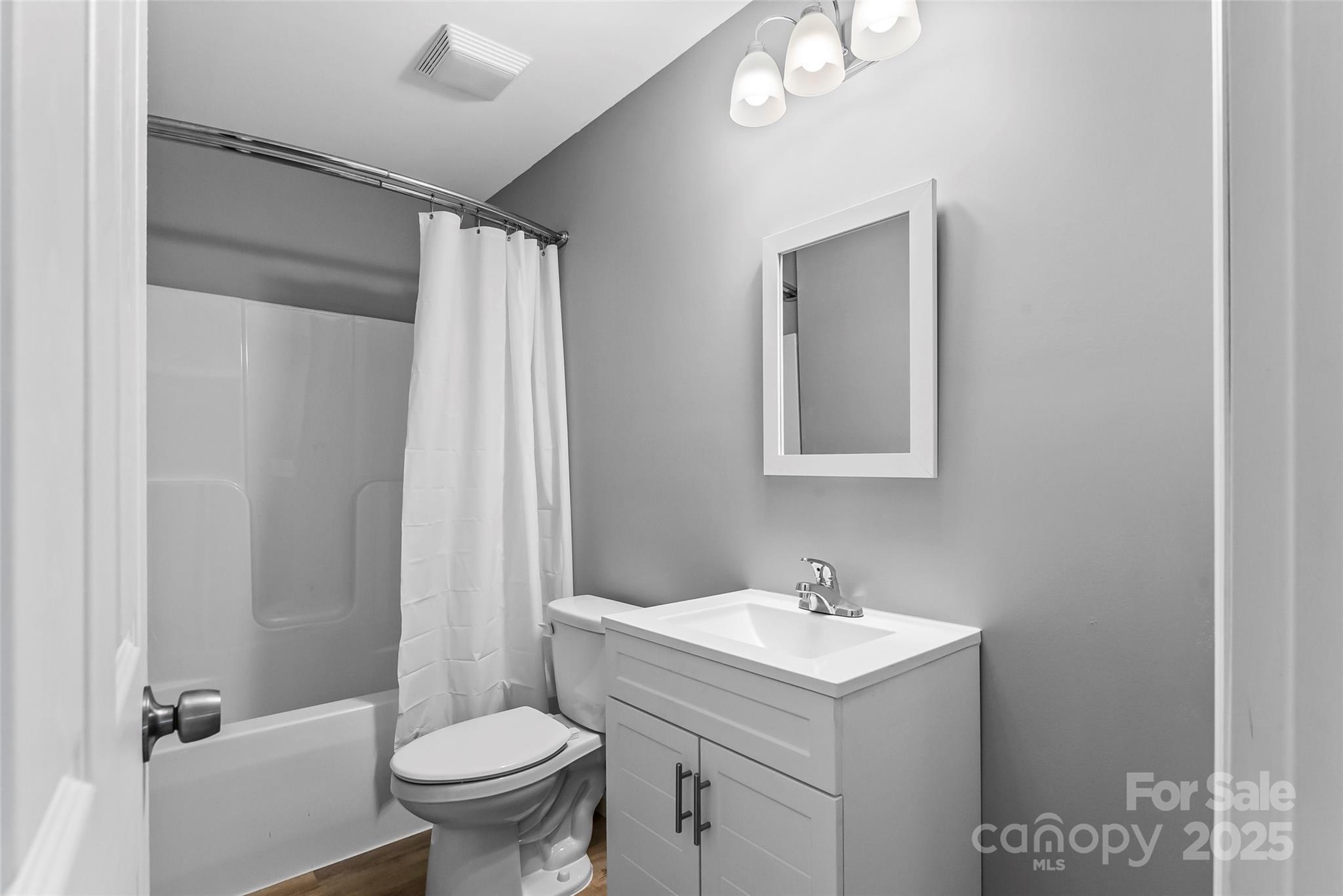 391 Springs East Road Lincolnton, NC 28092 - Photo 15 of 26 a bathroom with a sink toilet and shower