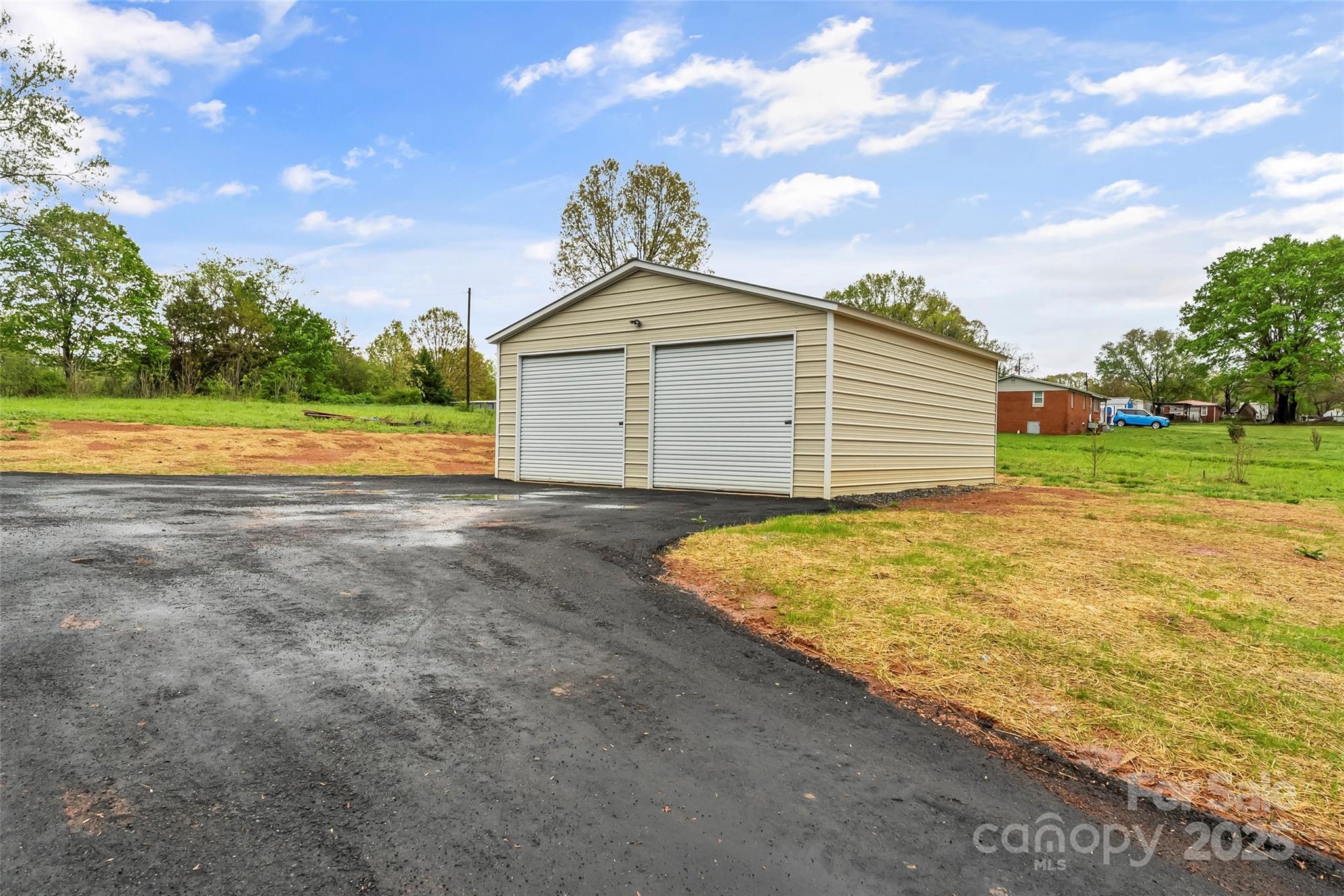 391 Springs East Road Lincolnton, NC 28092 - Photo 20 of 26 a view of backyard of house with green space