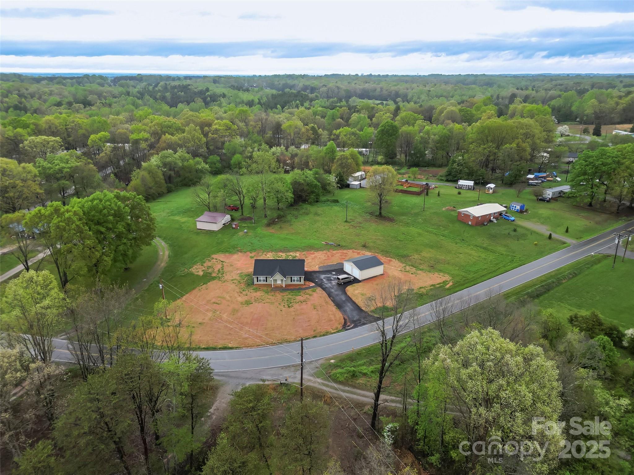 391 Springs East Road Lincolnton, NC 28092 - Photo 23 of 26 an aerial view of a golf course with outdoor space