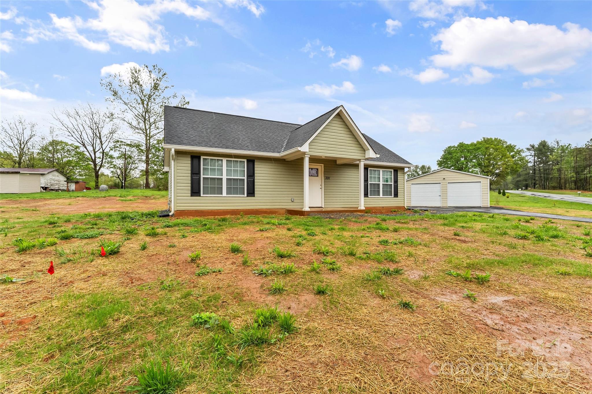 391 Springs East Road Lincolnton, NC 28092 - Photo 3 of 26 a front view of a house with garden