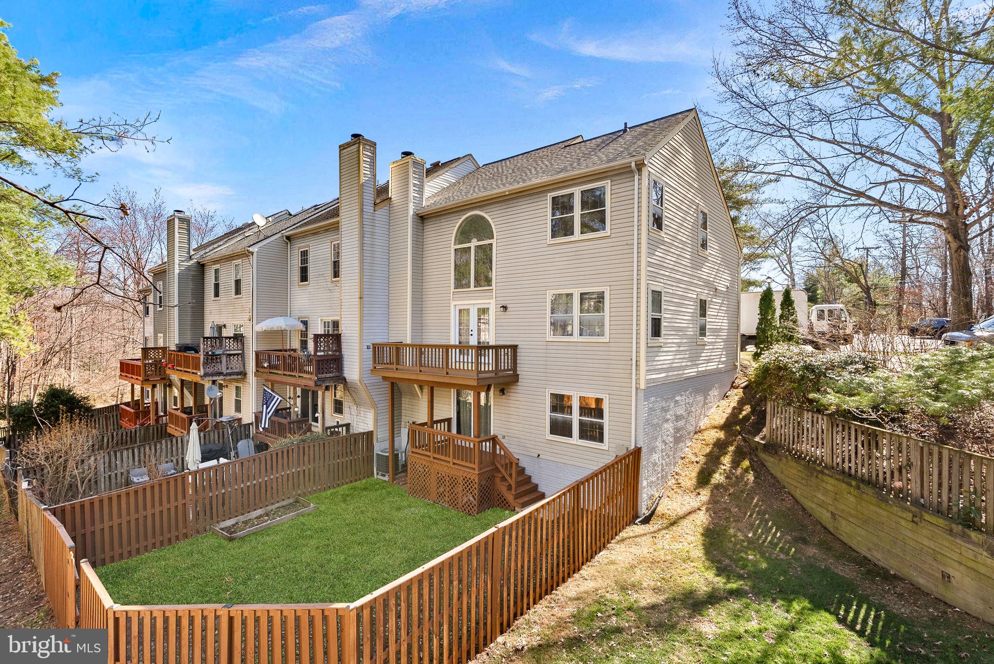 8228 Maple Ridge Avenue Springfield, VA 22153 - Photo 58 of 64 a view of a house with wooden fence