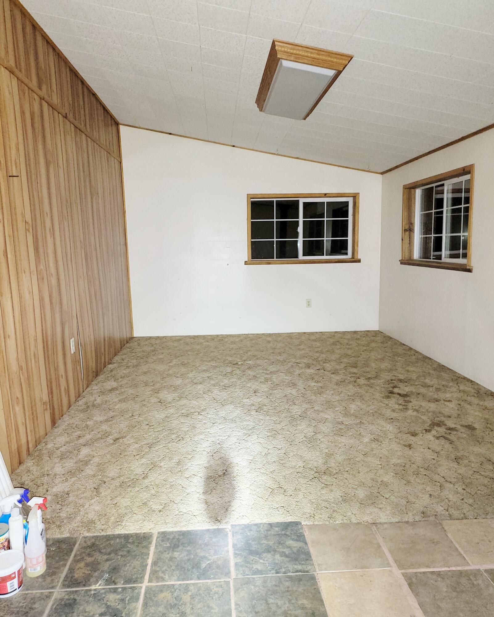 44961 Pine Shadows Road McArthur, CA 96056 - Photo 13 of 25 a view of an empty room with wooden floor and a window