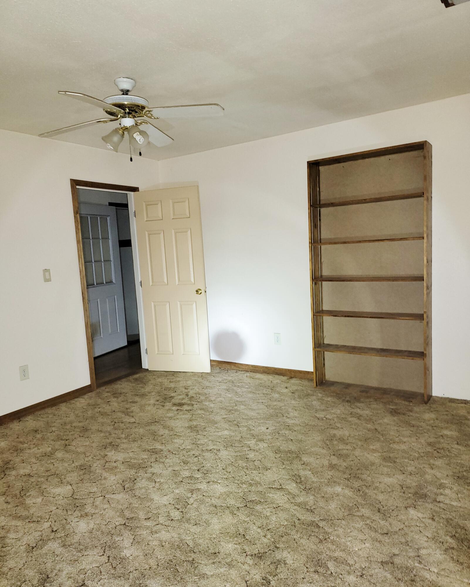 44961 Pine Shadows Road McArthur, CA 96056 - Photo 16 of 25 a view of an empty room with a ceiling fan