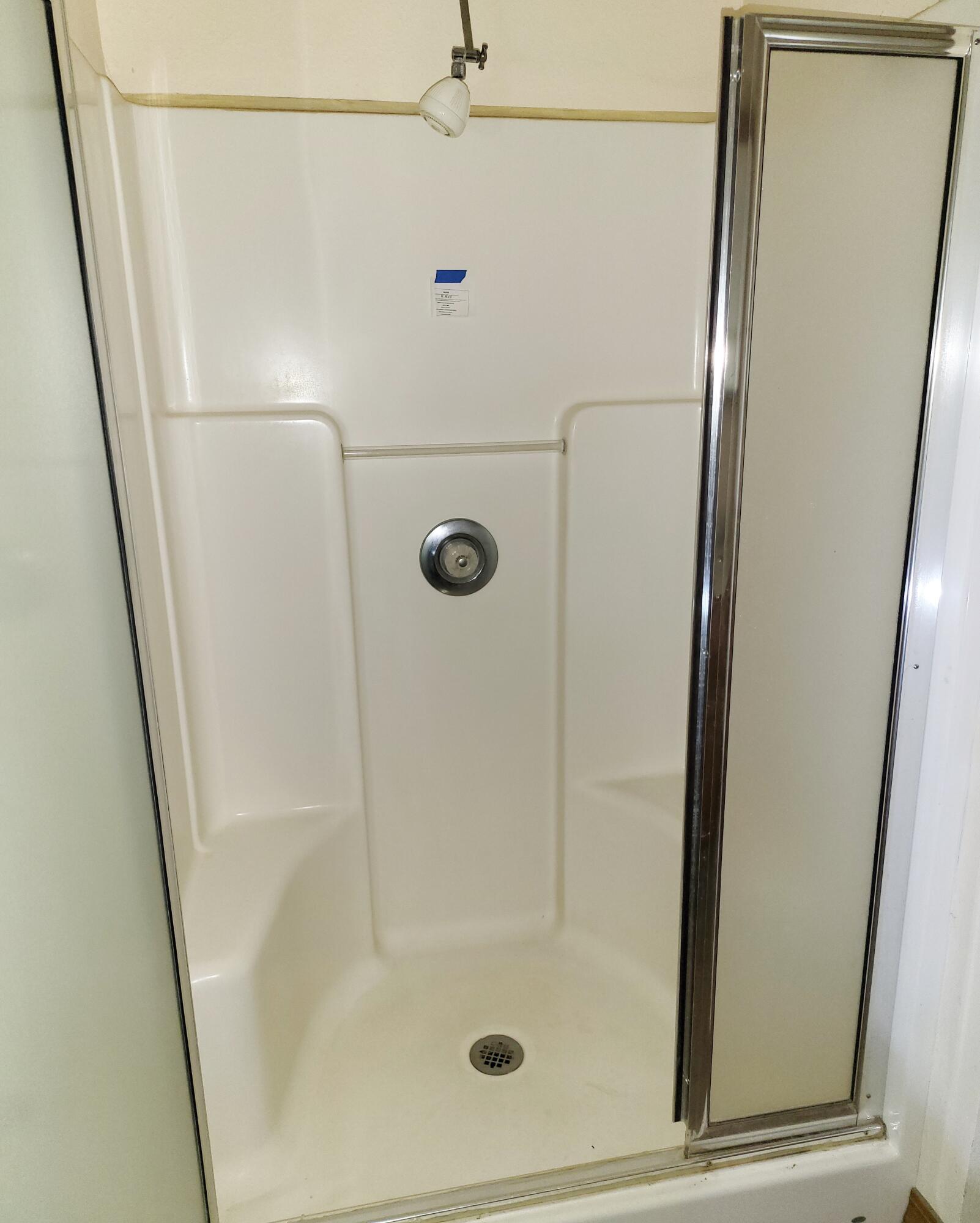 44961 Pine Shadows Road McArthur, CA 96056 - Photo 18 of 25 a bathroom with a glass shower door