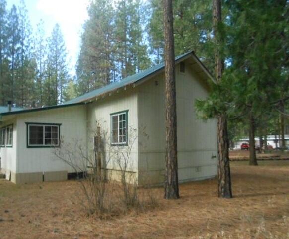 44961 Pine Shadows Road McArthur, CA 96056 - Photo 25 of 25 a backyard of a house with lots of green space
