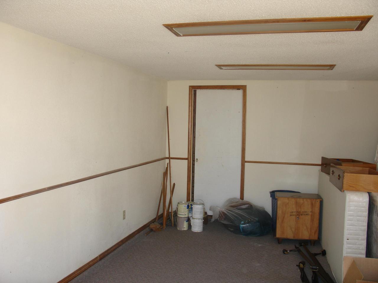4102 South Ong Street Amarillo, TX 79110 - Photo 4 of 5 a view of storage and utility room with two windows