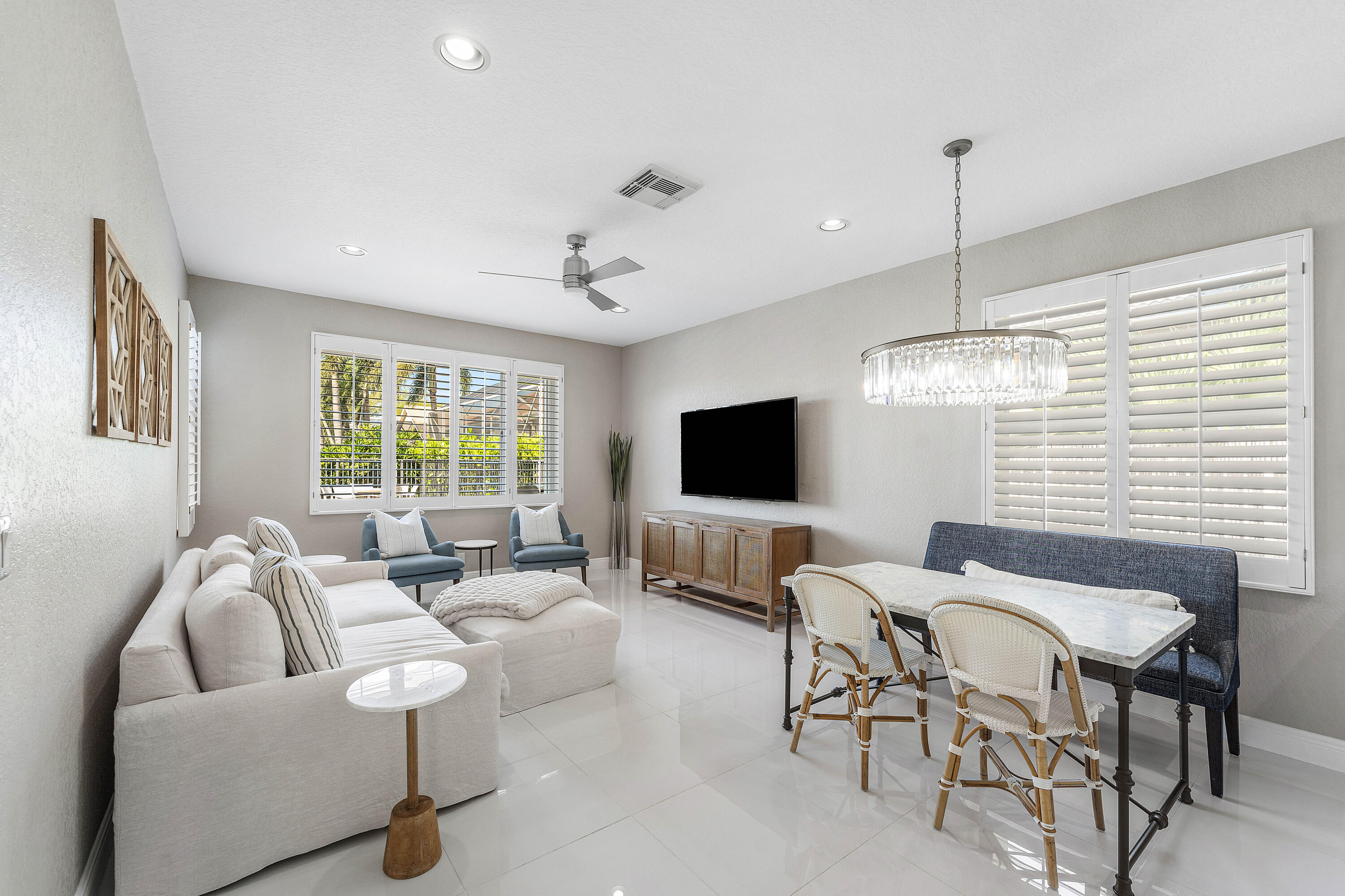121 Palm Circle Lake Worth, FL 33462 - Photo 15 of 63 a living room with furniture and a flat screen tv