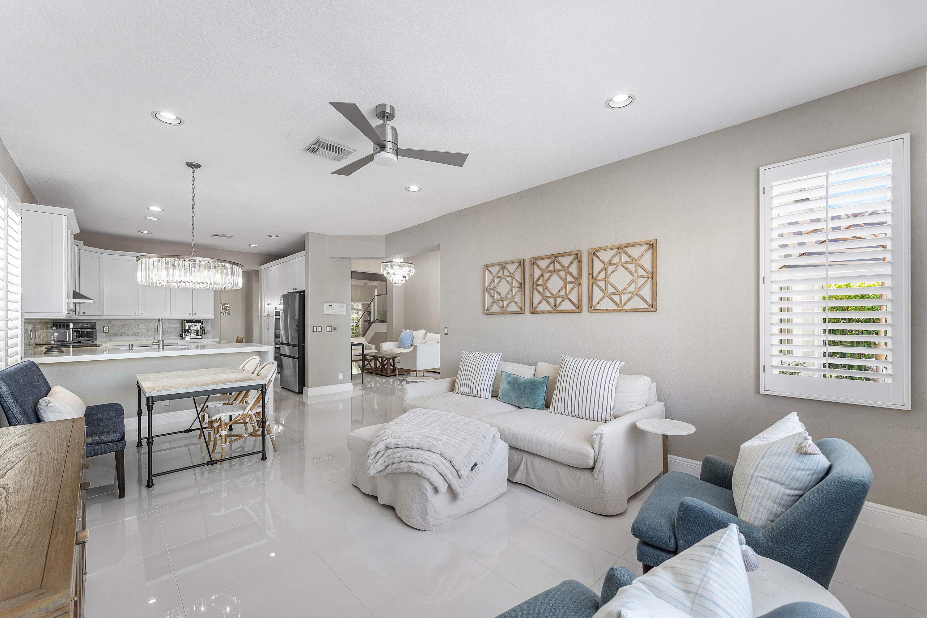 121 Palm Circle Lake Worth, FL 33462 - Photo 16 of 63 a living room with furniture and a large window