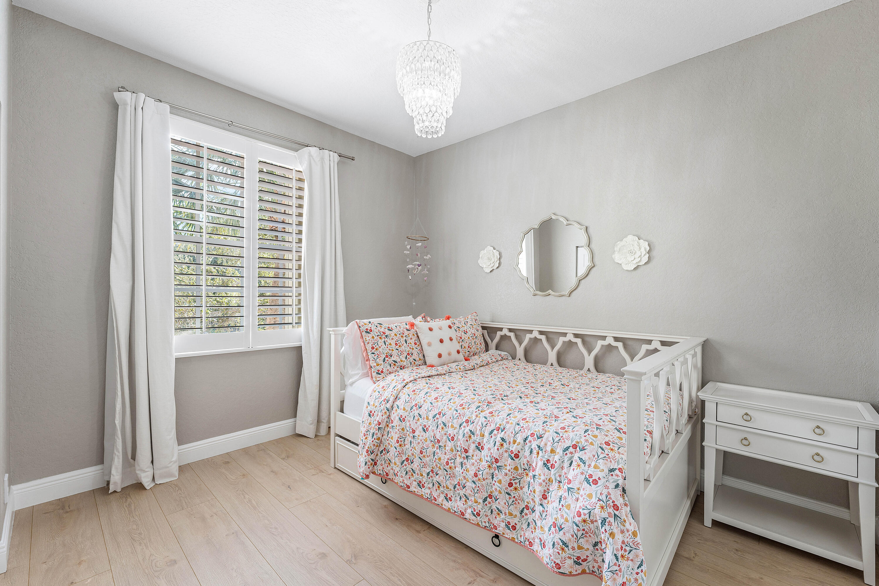 121 Palm Circle Lake Worth, FL 33462 - Photo 30 of 63 a bedroom with a bed and a window