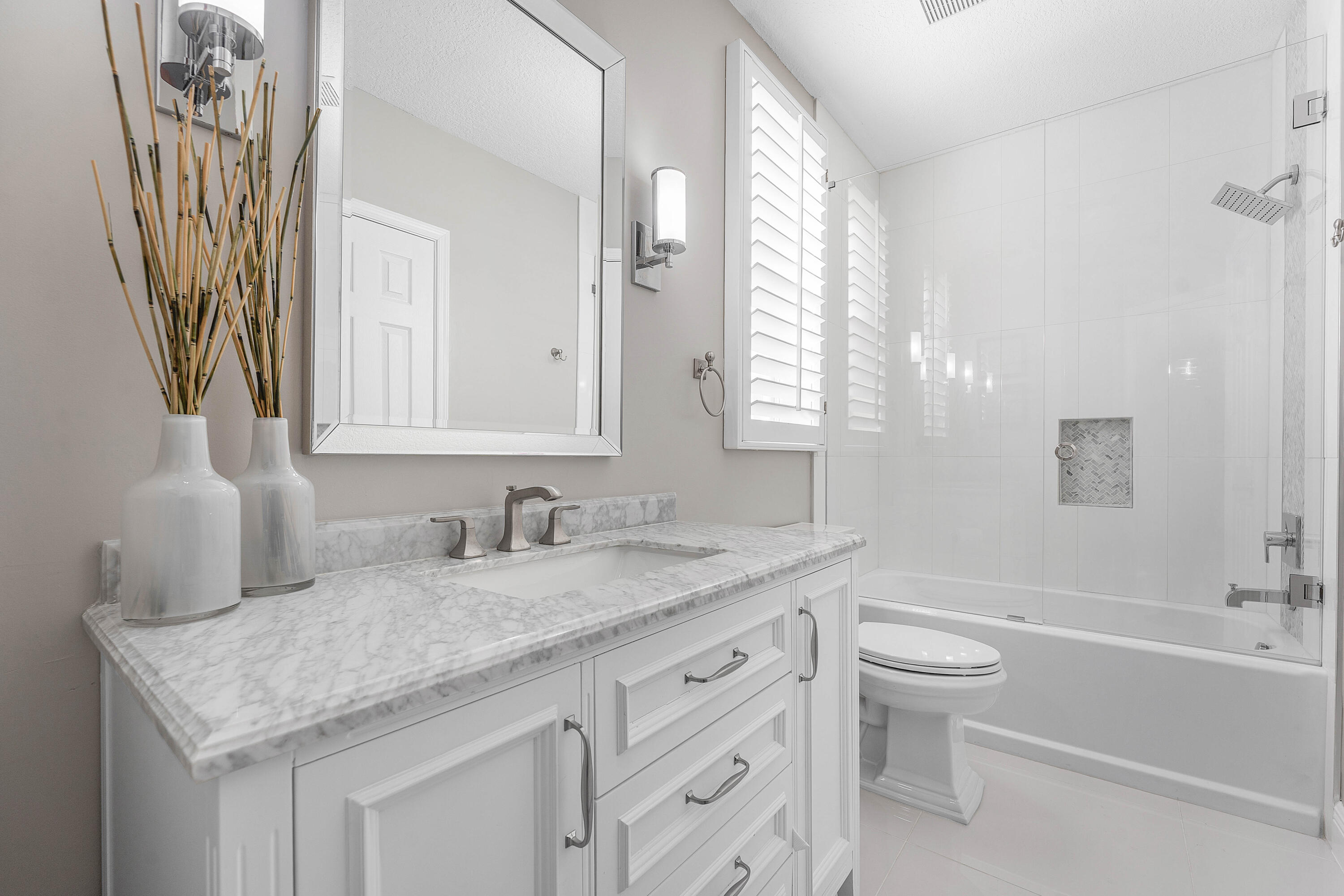 121 Palm Circle Lake Worth, FL 33462 - Photo 31 of 63 a bathroom with a granite countertop sink and a mirror