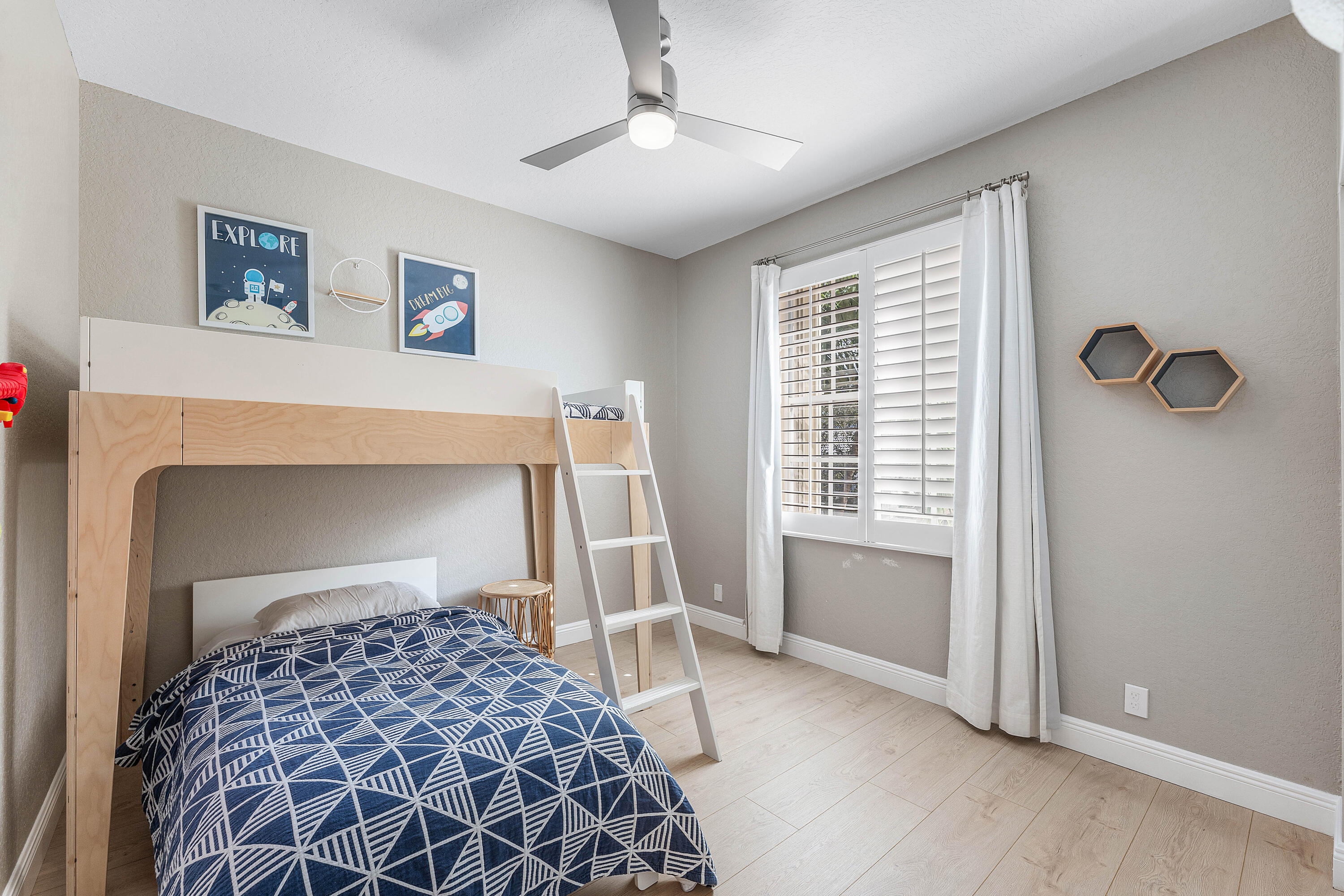 121 Palm Circle Lake Worth, FL 33462 - Photo 32 of 63 a bedroom with a bed and a window