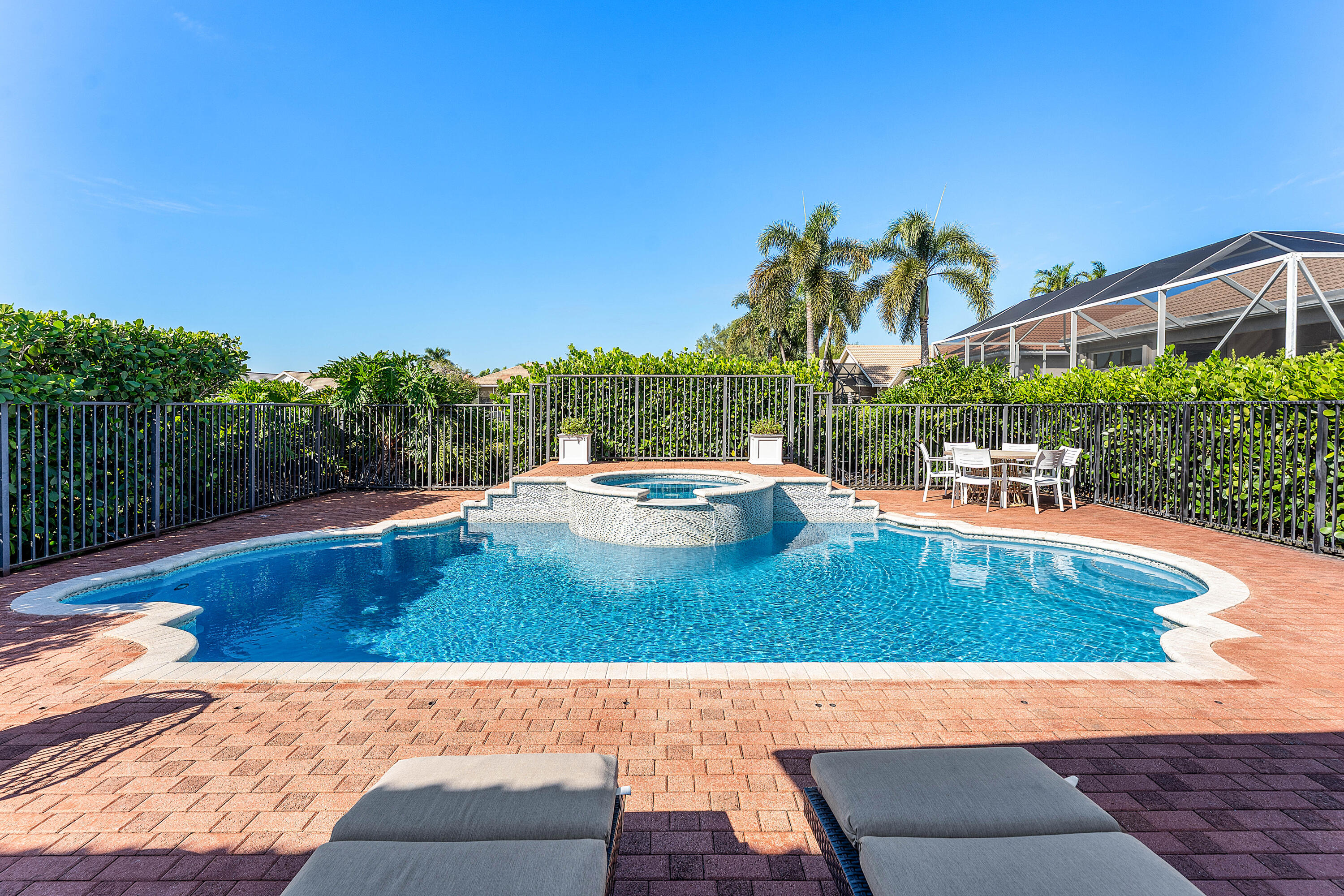 121 Palm Circle Lake Worth, FL 33462 - Photo 38 of 63 a view of swimming pool with outdoor seating and plants