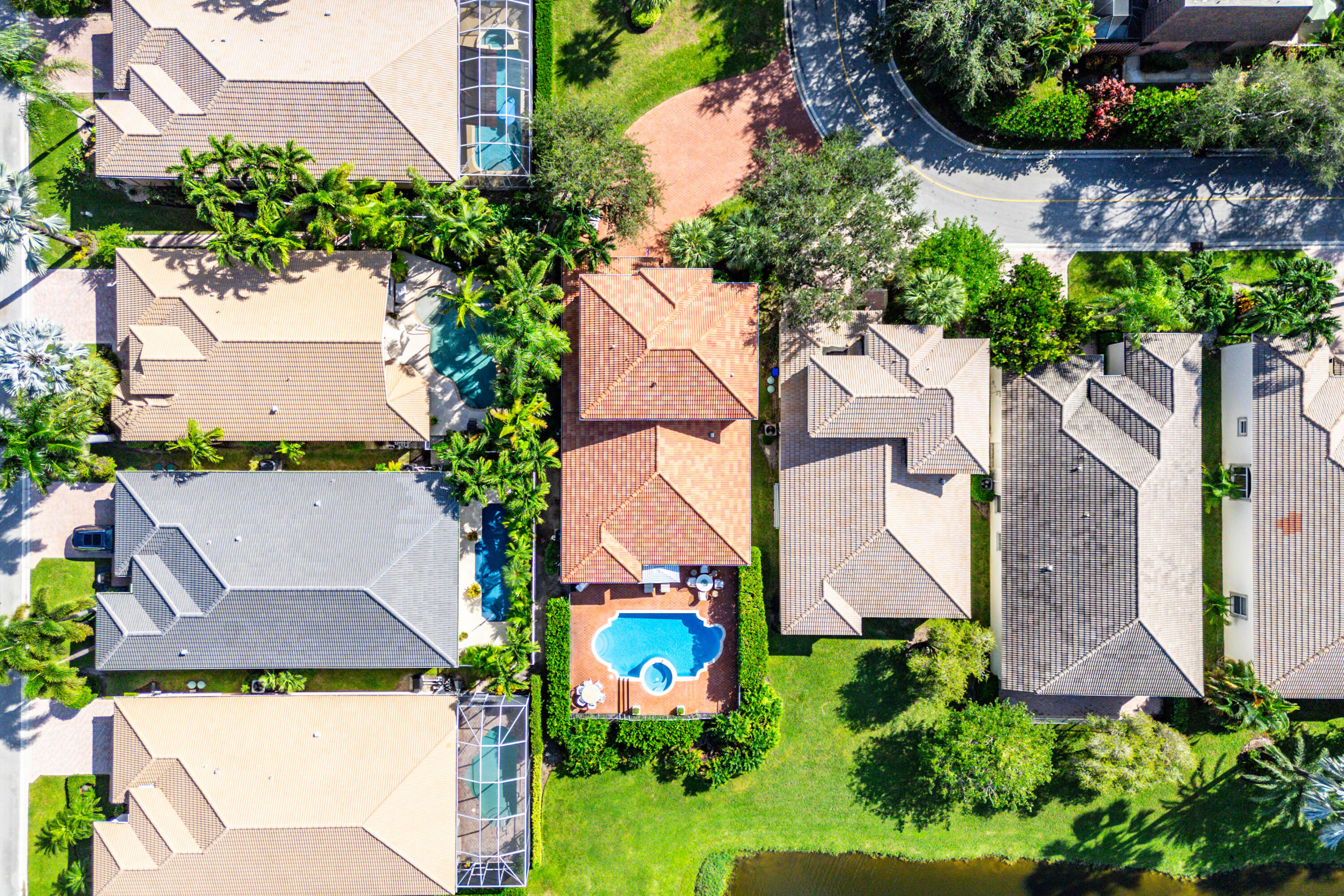 121 Palm Circle Lake Worth, FL 33462 - Photo 55 of 63 an aerial view of a house with a yard and garden