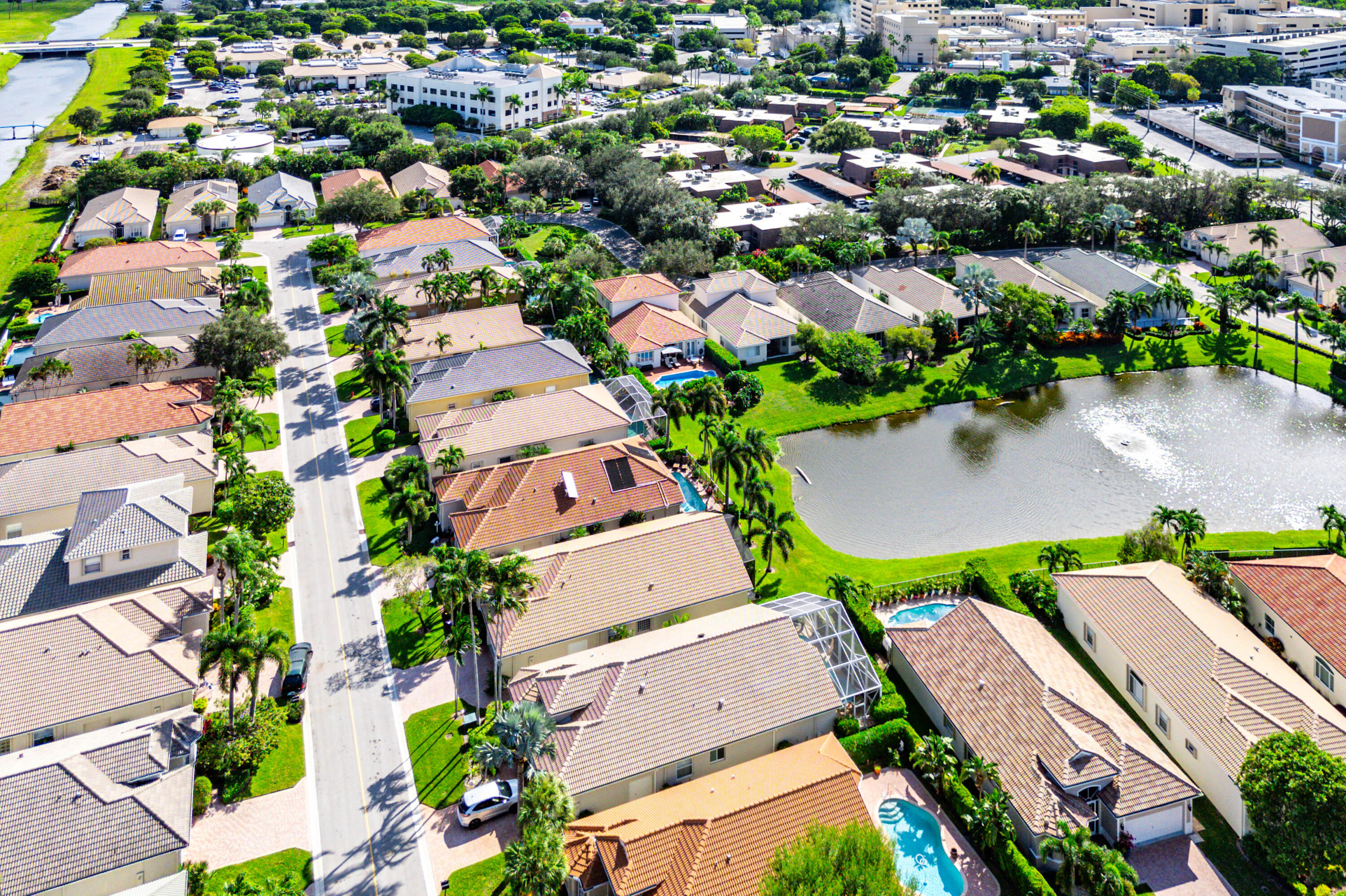 121 Palm Circle Lake Worth, FL 33462 - Photo 57 of 63 an aerial view of residential houses with outdoor space