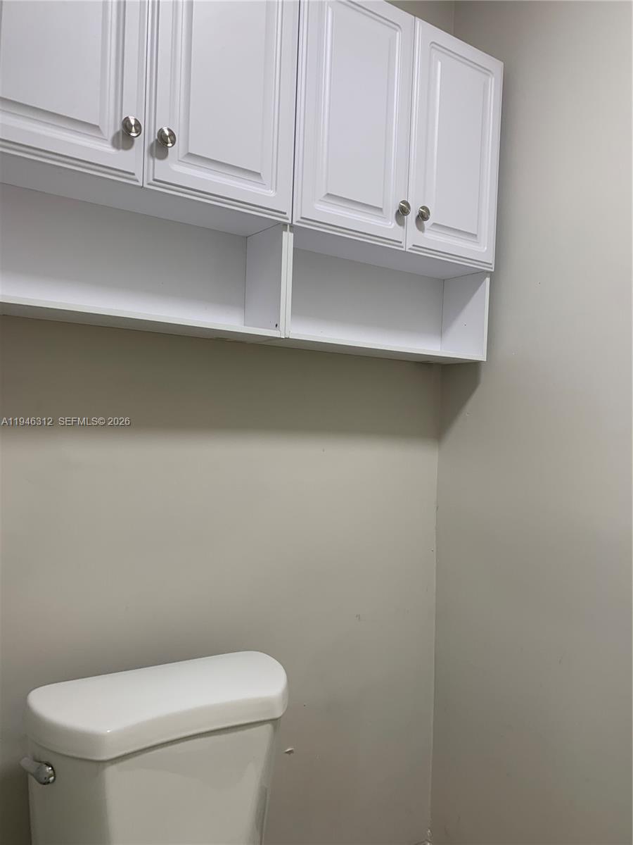 821 Southwest 29th Court, Unit 3 Miami, FL 33135 - Photo 7 of 10 a bathroom with a toilet