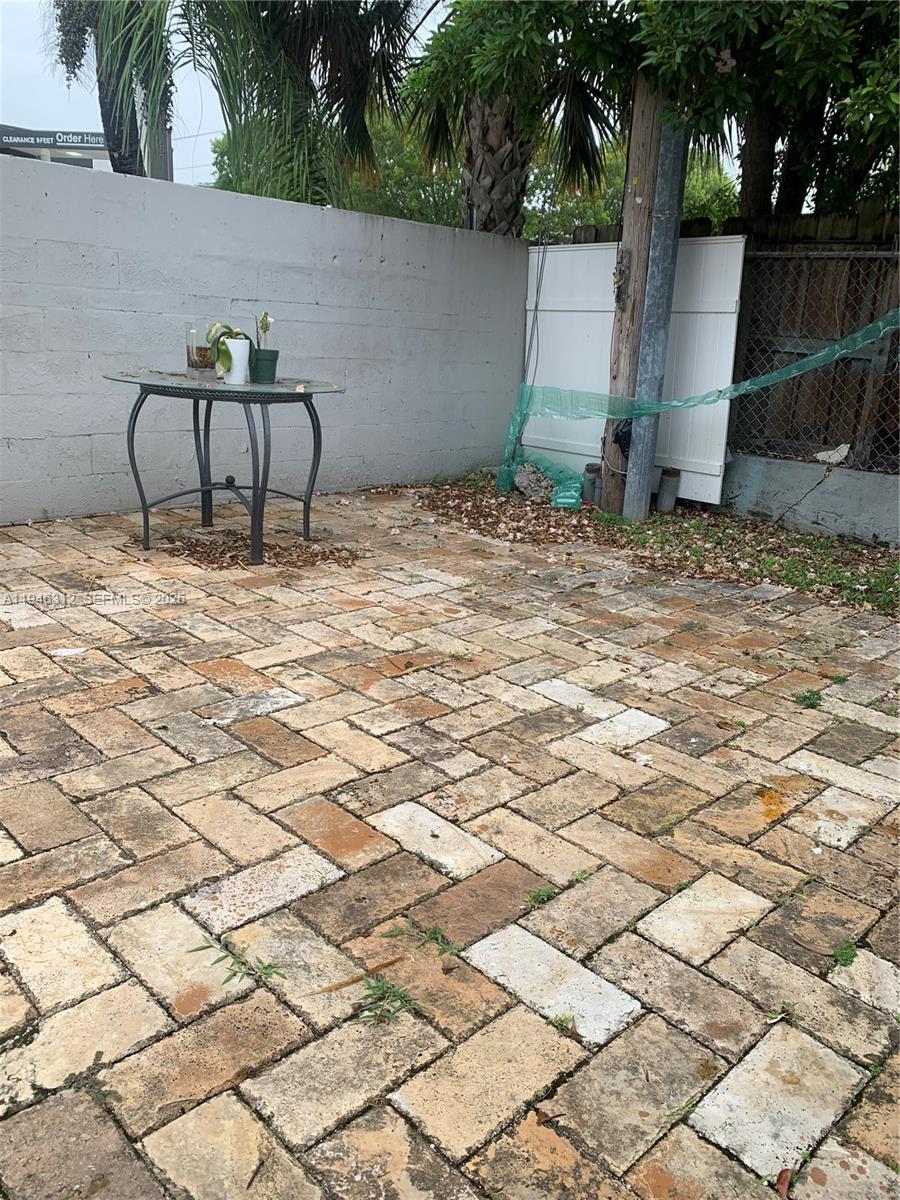 821 Southwest 29th Court, Unit 3 Miami, FL 33135 - Photo 9 of 10 a view of a backyard