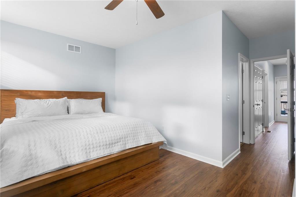 1410 Federal Street Pittsburgh, PA 15212 - Photo 20 of 42 a bedroom with a bed and wooden floor