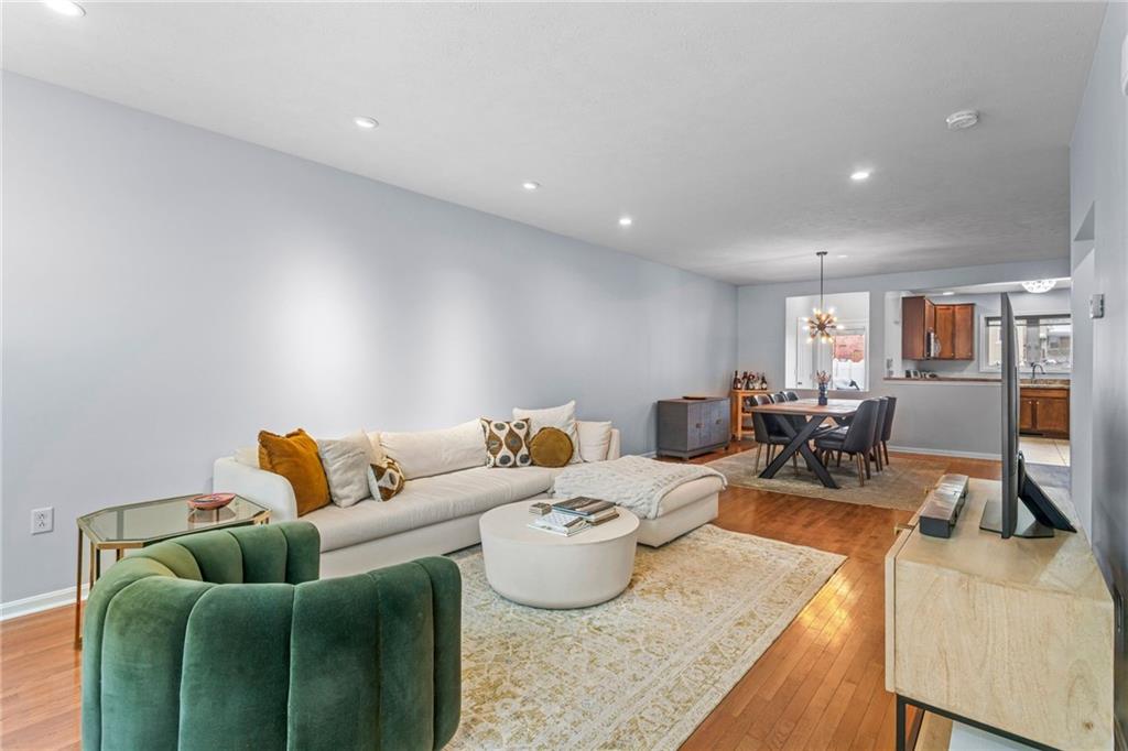 1410 Federal Street Pittsburgh, PA 15212 - Photo 2 of 42 a living room with furniture and a couch