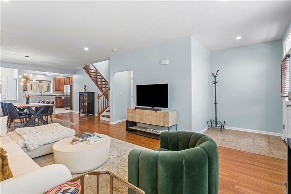 1410 Federal Street Pittsburgh, PA 15212 - Photo 3 of 42 a living room with furniture and a flat screen tv