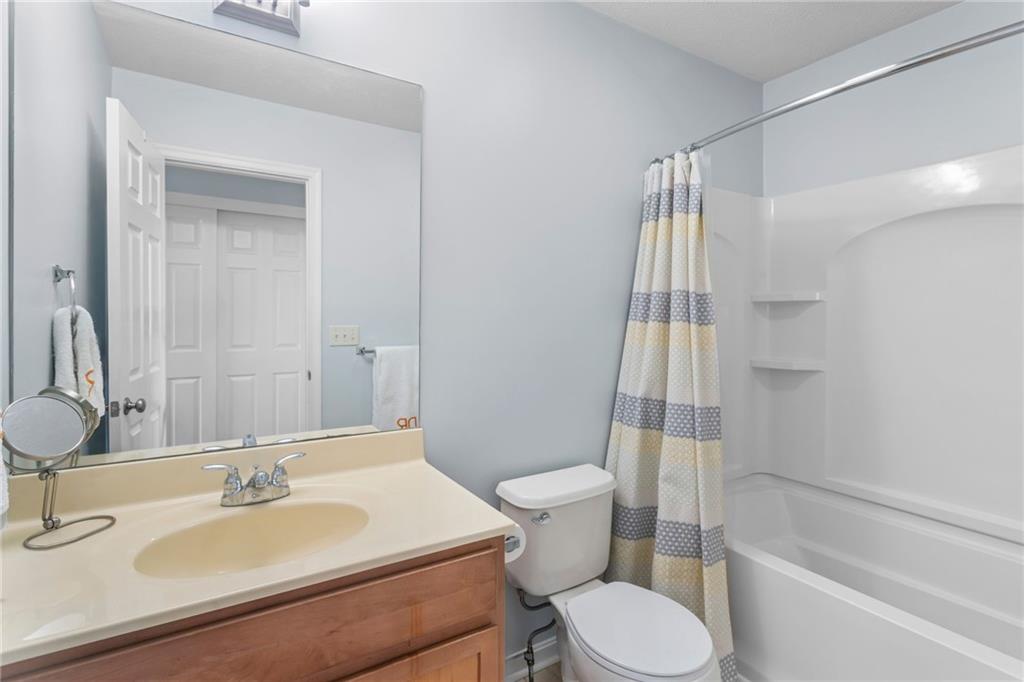 1410 Federal Street Pittsburgh, PA 15212 - Photo 31 of 42 a bathroom with a sink toilet and shower