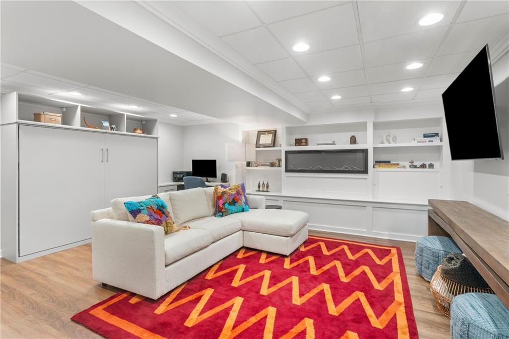 1410 Federal Street Pittsburgh, PA 15212 - Photo 33 of 42 a living room with furniture and a flat screen tv