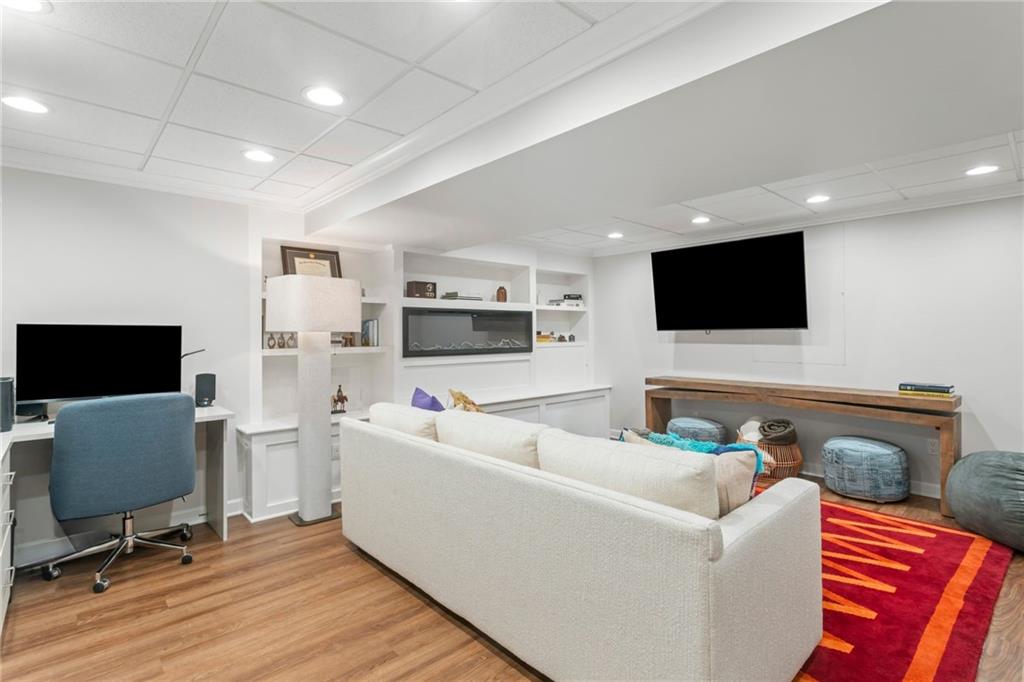 1410 Federal Street Pittsburgh, PA 15212 - Photo 34 of 42 a living room with furniture and a flat screen tv