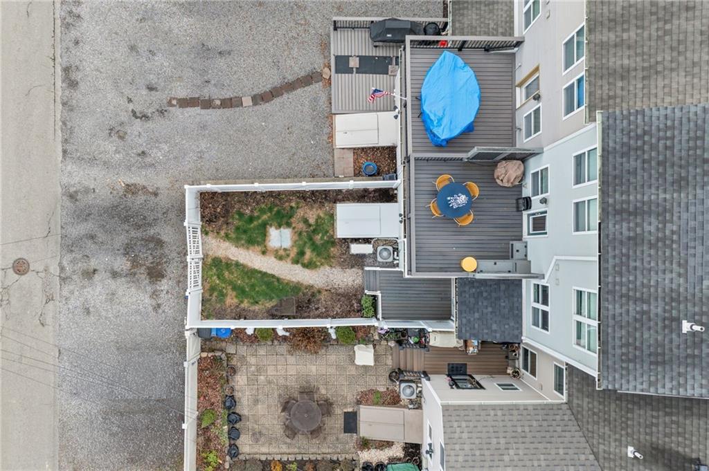 1410 Federal Street Pittsburgh, PA 15212 - Photo 40 of 42 a picture of a bathroom with a sink and a mirror