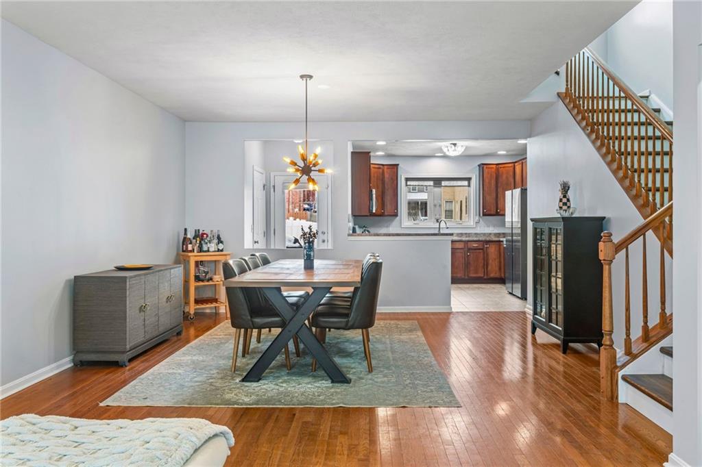 1410 Federal Street Pittsburgh, PA 15212 - Photo 6 of 42 a view of a dining room with furniture window and wooden floor