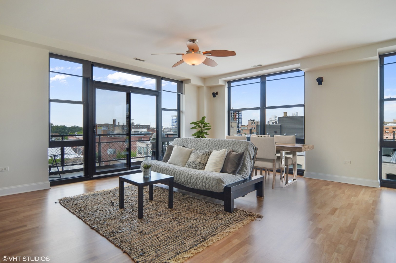 1260 West Washington Boulevard, Unit 508 Chicago, IL 60607 - Photo 2 of 10 a living room with furniture and a large window